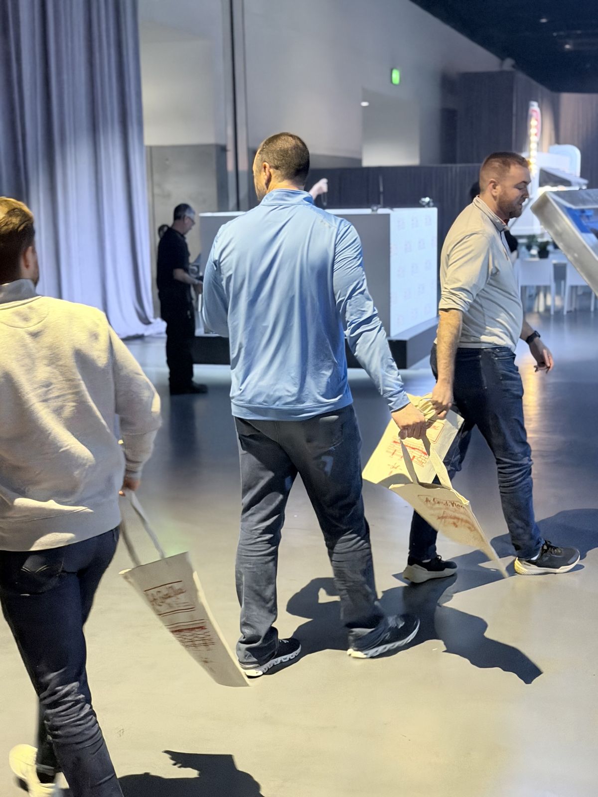 Merch Troop live printing — presses rolling at the event